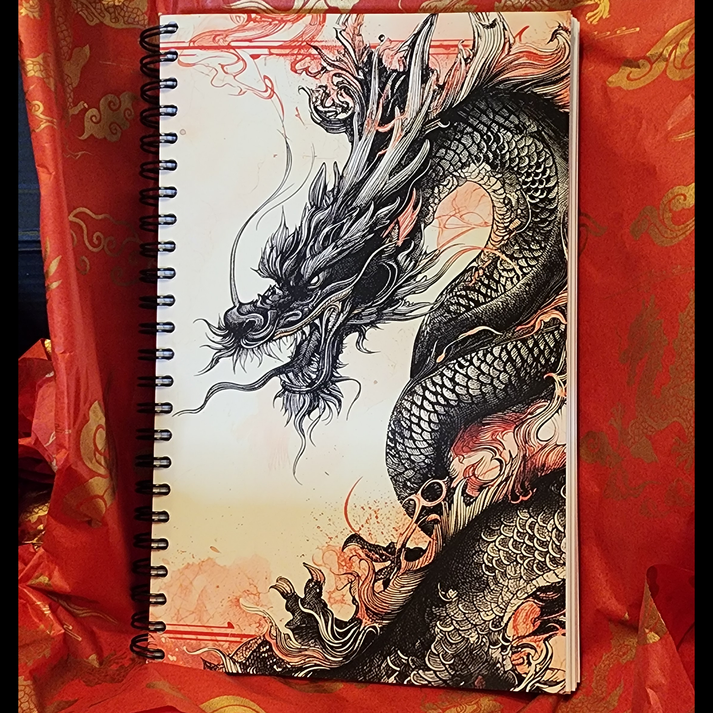 Exclusive wire bound lined dragon journal with custom art and dragon wisdom quotes every 10 pages.