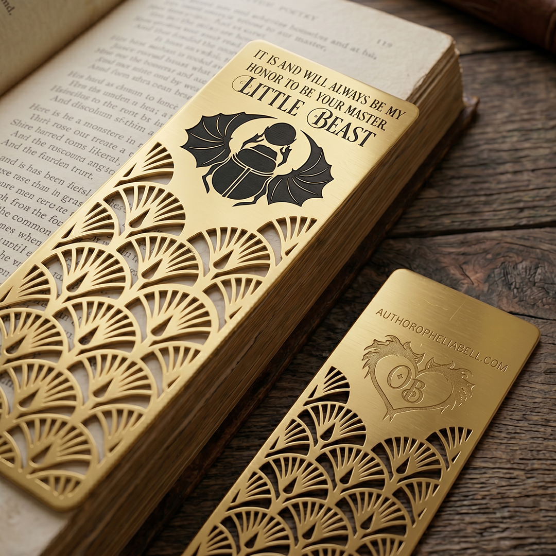 Dragon Betrayed Deluxe Edition — gold scarab metal bookmark